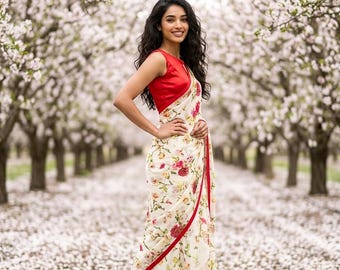 Sari de diseño floral en color blanco roto con borde rojo, georgette sintético ligero, blusa sin coser.