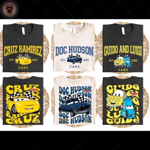 six t-shirts with various car-related designs and text, including the characters from the animated film "Cars".