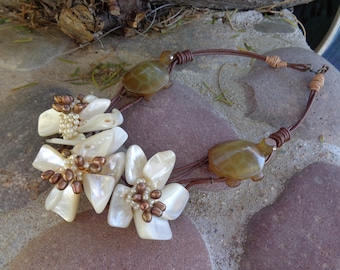 Romantic Handmade Shell Flowers with Hand Carved Stone Turtles on Leather