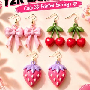 May include: Digital file set for 3D printed earrings featuring Y2K EARRING STL text. Includes three designs: light pink faceted bows, red cherries with green leaves, and pink strawberries with purple tops, all with gold-toned earring hooks.