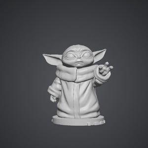 May include: A white ceramic mug with a black handle and the text "But First, Coffee" in a bold, black font. The mug is on a wooden surface. The mug is approximately 10 cm tall.