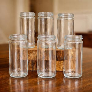 Frascos de vidrio transparente de 4 oz (tapas negras mate), para especias y recuerdos, paquete de 24