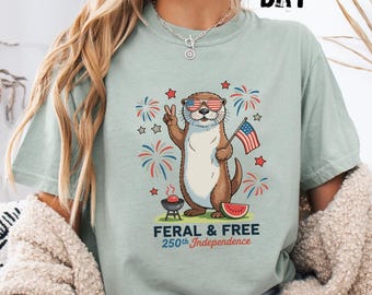 Comfort Colors Otter Shirt, Feral and Free 250th Independence Day Tee, Funny Patriotic Animal Shirt, 4th of July Graphic Top,USA Summer Gift