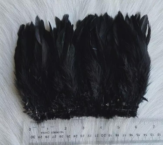 Schalppen Saddle Hackle.. Fly Tying Feather. Schalppen Hackle (Feather) 6" Strip, 15 cm... Color; Black.