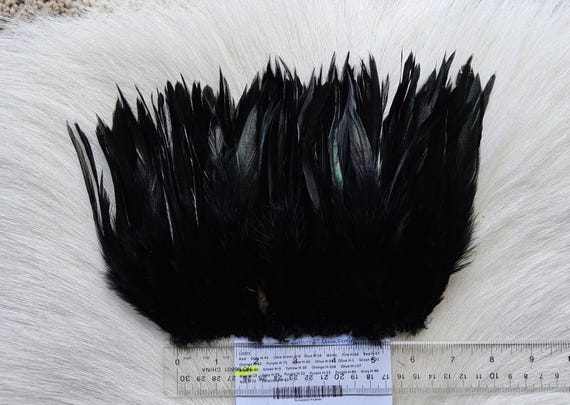 Saddle Hackle.. Fly Tying Feather. Saddle Hackle (Feather) 6" Strip, 15 cm... Color;  Black,