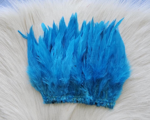Schalppen Saddle Hackle.. Fly Tying Feather. Schalppen Hackle (Feather) 6" Strip, 15 cm... Color;  Blue H-13