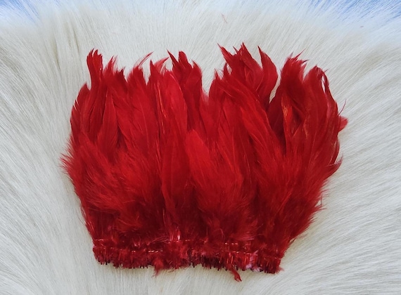 Schalppen Saddle Hackle.. Fly Tying Feather. Schalppen Hackle (Feather) 6" Strip, 15 cm... Color;  Red H-72