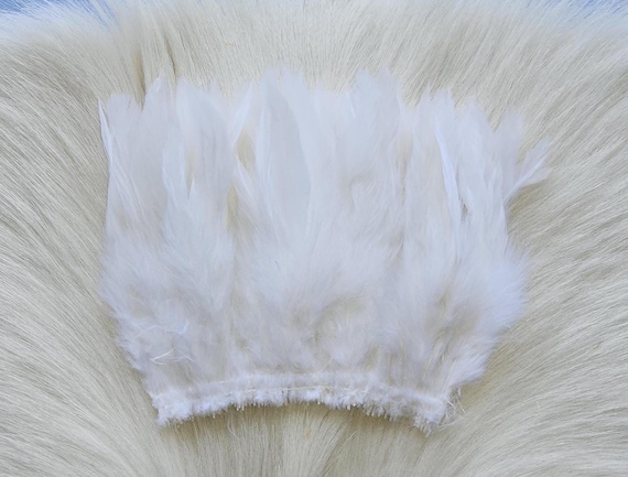 Schalppen Saddle Hackle.. Fly Tying Feather. Schalppen Hackle (Feather) 6" Strip, 15 cm... Color;  White.