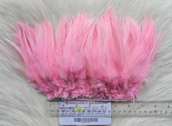 Saddle Hackle.. Fly Tying Feather. Saddle Hackle (Feather) 6" Strip, 15 cm... Color;  Pink-016.,