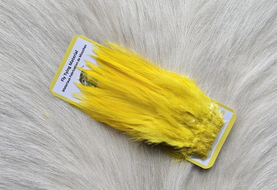 Fly Tying Feather. Saddle Hackle (Feather) 2" Strip, 5 cm... Color; Yellow-018