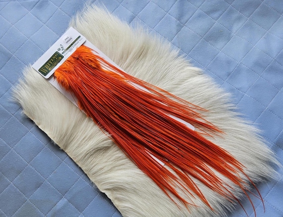 Whiting Saddle Hackle.  Dry Fly Rooster Full Saddle,, Color,  Dyed Orange ..   Free Shipping. From Canada