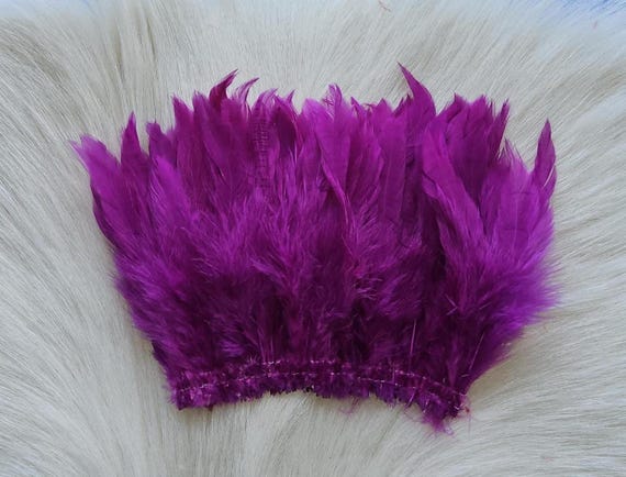 Schalppen Saddle Hackle.. Fly Tying Feather. Schalppen Hackle (Feather) 6" Strip, 15 cm... Color;  Purple H-52