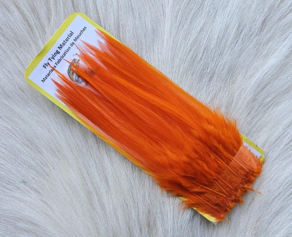 Saddle Hackle,, Fly Tying Hackle (Feather)... 2" Strip, 5.1 cm ,  (New) Selected Saddle Hackle Feather. Color, Orange,  Attention.