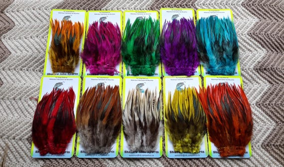 Fly Tying Feathers..  Super Special....  (10)  packs  of "Badger" 2" Strip  Mix  Strung Saddle Hackle Feather,,  Asst. Colors..  Combo #17.