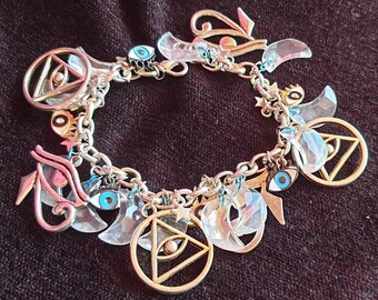 Eye of Horus Charm Bracelet: Silver Metal, Diamante & Enamel Eyes, Crystal Moons