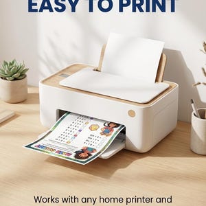 May include: A white and light wood home printer with a sheet of paper feeding through the front. The paper features a printed math worksheet with colorful cartoon characters. Text above reads EASY TO PRINT and below reads Works with any home printer and standard US Letter/A4 paper.