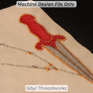 May include: Embroidered design of a dagger with a red handle and silver blade, accented with orange and gold thread. The design is on a cream-colored fabric. Text at the top reads "Machine Design File Only_", and at the bottom, "Sibyl Threadworks."