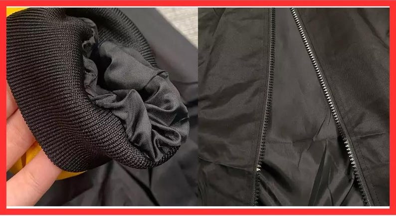 May include: A black jacket featuring a ribbed knit cuff and a full-length front zipper closure. The garment is constructed from a smooth, solid black fabric with a matching black lining visible at the sleeve opening and along the zipper track.