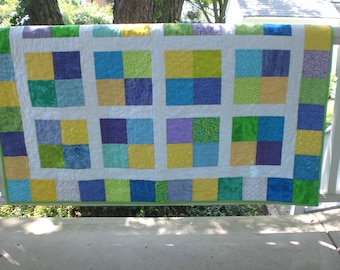 Baby boy quilt in blue, green and yellow