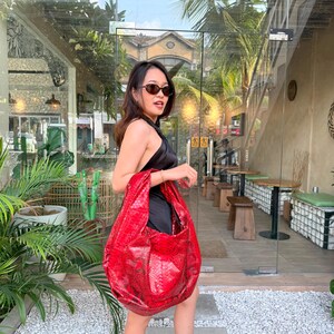 Hobo-tas van glanzend rood exotisch pythonleer