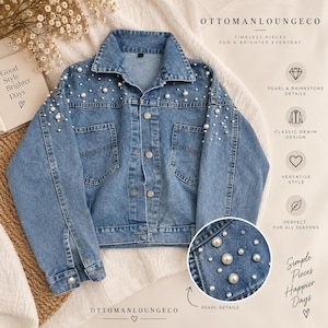 May include: A blue denim jacket featuring a collar, long sleeves with buttoned cuffs, and a front button closure. The upper portion of the jacket is embellished with scattered white pearls and small clear rhinestones. Two chest pockets are visible.