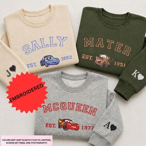 three sweatshirts with different designs and text, including characters from the Cars movie franchise.