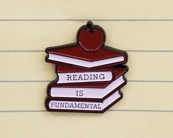 Reading is Fundamental enamel pin benfitting NYC Books Through Bars