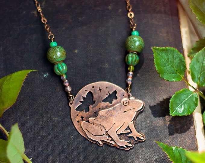 copper frog & moth pendant with ceramic and glass beads