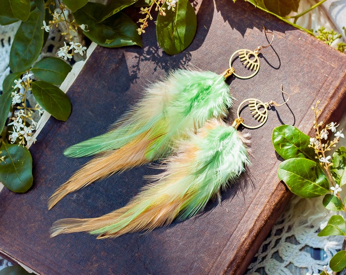 feather earrings in melon & soft gold with brass evil eye charms // boho, bohemian jewelry, long earrings, dangle, statement earrings