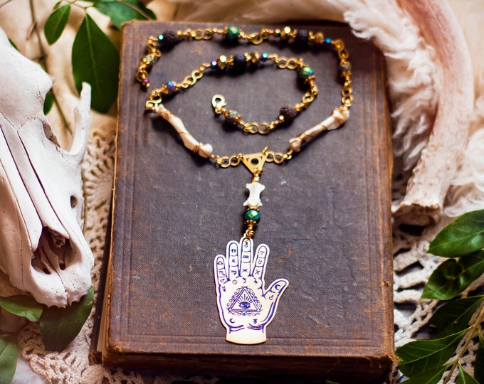 brass eye of providence palmistry hand necklace with real bones & beaded chain