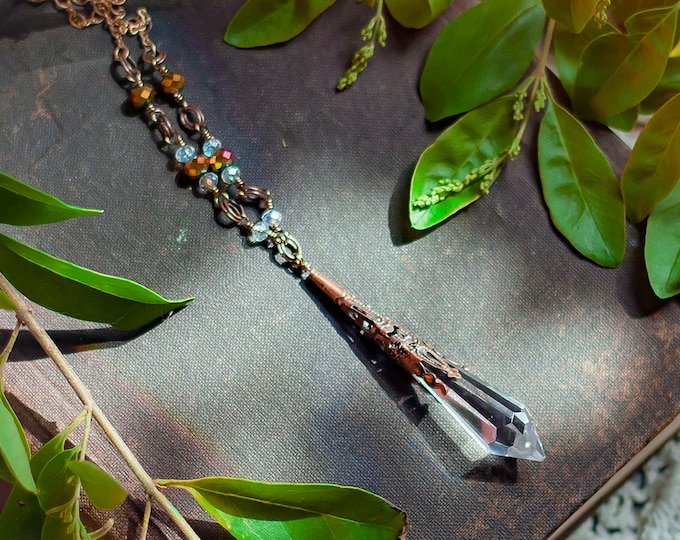 faceted lead crystal icicle pendant in copper filigree cap on beaded chain