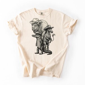 The Frontier Trio Graphic Tee - Bison, Croc, & Horse Cowboy Squad - Rugged Western Shirt