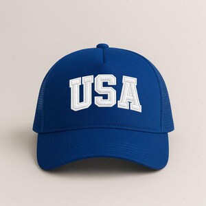 A blue baseball cap with the word "USA" printed on it.