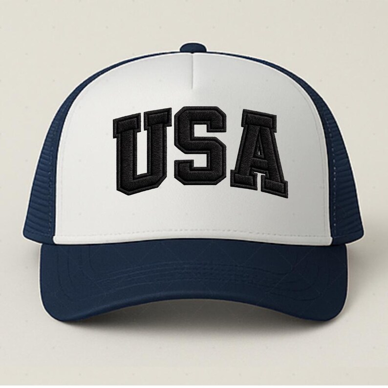 A white and navy blue baseball cap with the word "USA" printed on it.
