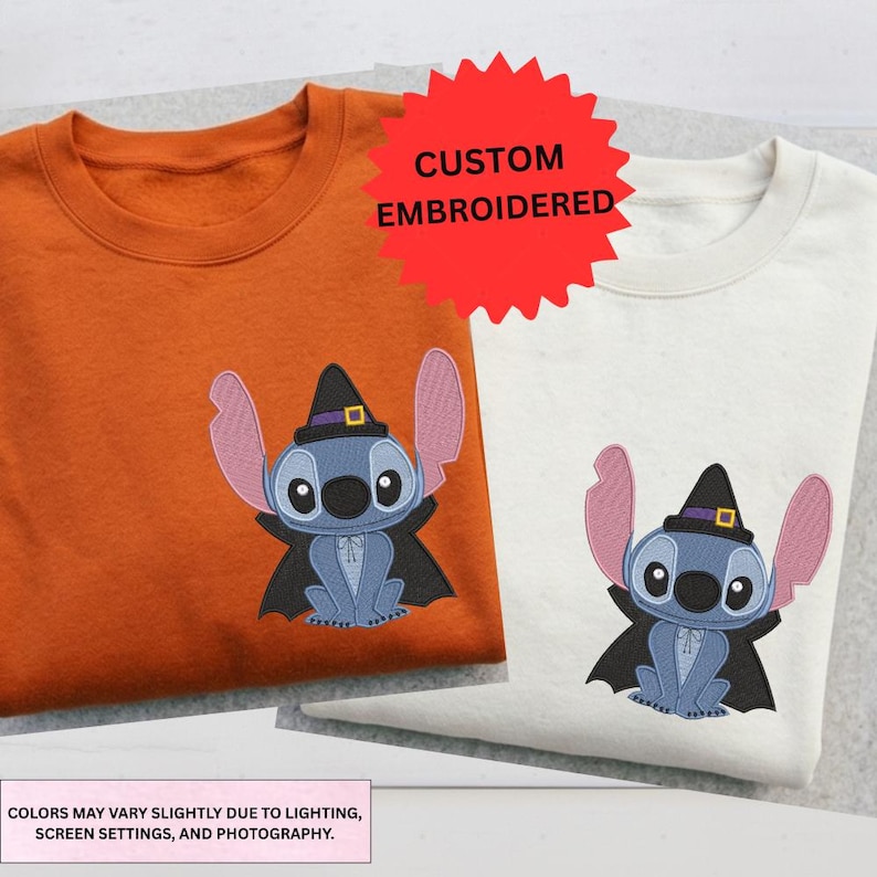 two t-shirts with a character design, one orange and one white, both with a witch-like motif.