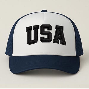 A white and navy blue baseball cap with the word "USA" printed on it.