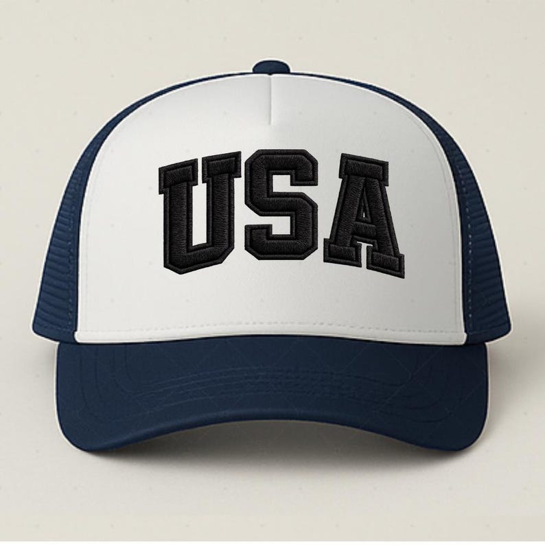 A white and navy blue baseball cap with the word "USA" printed on it.