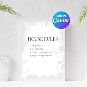 Könnte beinhalten: Ein weißer, gerahmter Schild mit dem Text „HAUSREGELN“ und vier Regeln. Das Schild hat ein Aquarell-Blumenmuster und die Worte „EDIT IN Canva“ in einem blau-violetten Kreis.