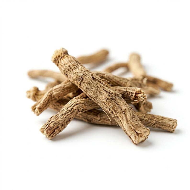 May include: A small pile of dried, light brown plant roots with a rough, fibrous, and textured surface. The roots are cylindrical, woody, and irregular in shape, featuring small ridges and natural markings across their exterior surfaces.