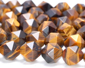 May include: A strand of faceted tiger's eye beads in shades of brown and gold. The beads are shaped like multifaceted stars.