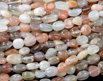 May include: A strand of sunstone beads in various shades of white, gray, and peach. The beads are oval shaped and have a smooth, polished finish.