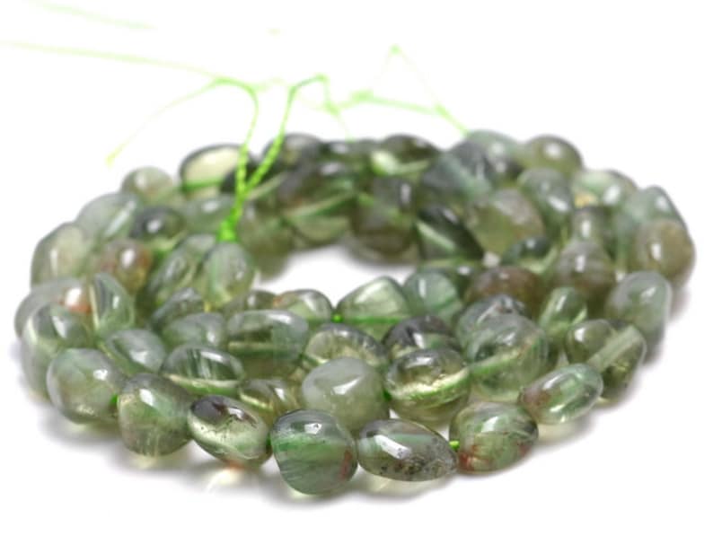 Green Round Peridot Loose Gemstones At ₹ 100/carat In New Delhi | ID