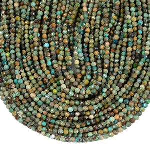 May include: Close-up of a collection of small, faceted beads in shades of green, turquoise, and brown. The beads are strung together, creating a textured and colorful display. Ideal for jewelry making or crafting projects.