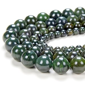 May include: A strand of dark green jade beads, each bead is round and smooth, with a polished finish. The beads are arranged in a graduated size, with the largest beads at the top and the smallest beads at the bottom.