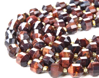 May include: A strand of red tiger's eye beads with a faceted, geometric shape. The beads are strung on a gold wire.