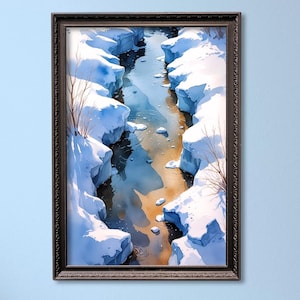 May include: A framed watercolor painting depicts a winter landscape. A narrow river flows between snow-covered banks, with blue and orange hues reflecting in the water. The artwork is encased in a dark brown wooden frame.