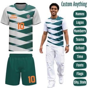May include: A football kit with a white and green geometric pattern. The jersey displays the text "ANY NAME" and the number "10" in orange. The set includes a jersey and shorts. The image also shows a person wearing a similar shirt.
