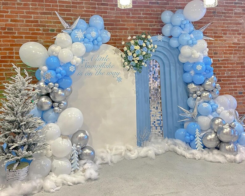 May include: A set of three ceramic mugs with a speckled, matte finish. The mugs are in shades of blue, green, and white. Each mug has a rounded handle and a simple, modern design. Perfect for coffee or tea.