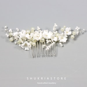 May include: A set of three ceramic mugs with a speckled, matte finish. The mugs are in shades of cream, light brown, and dark brown. Each mug has a simple, minimalist design, perfect for coffee or tea.