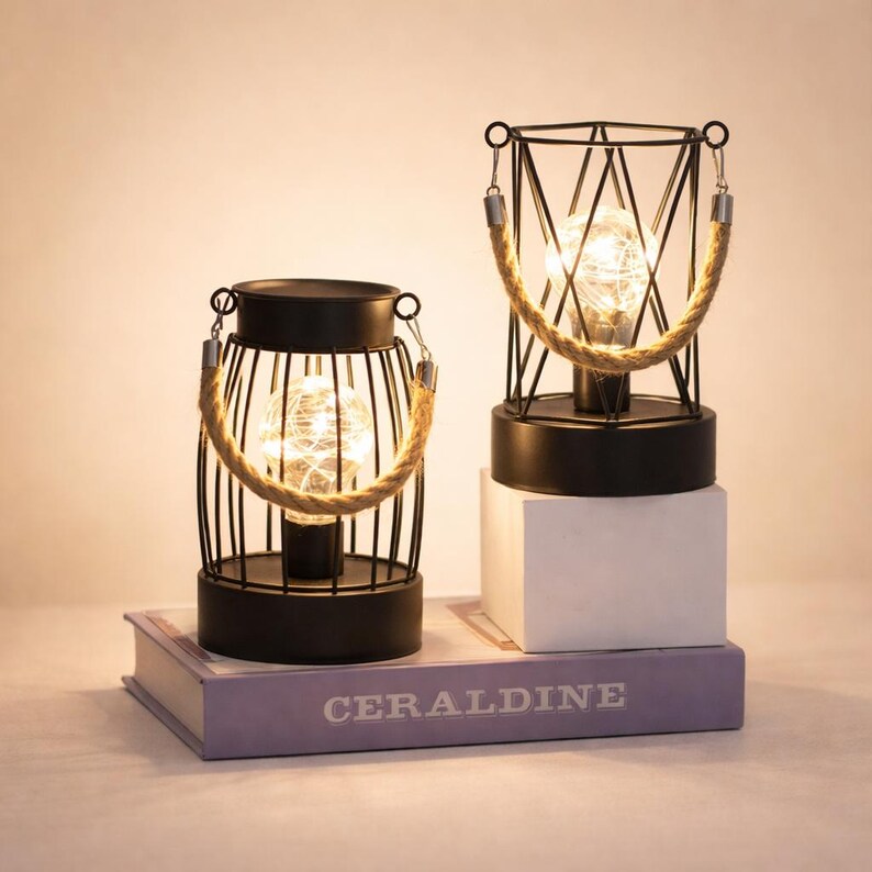Modern wire cage lantern lamp on book stack decorative lighting